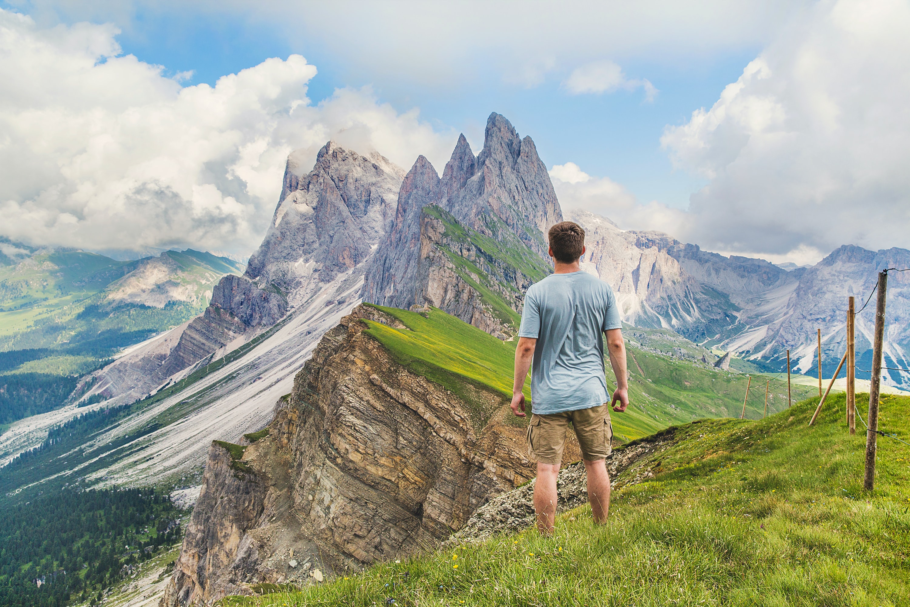 Man hiking in the Dolomites -Photo by Joshua Earle